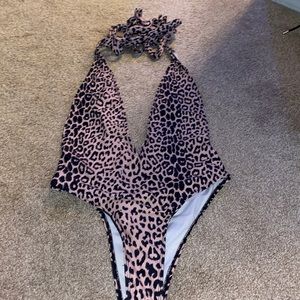 Leopard printed one piece bathing suit.